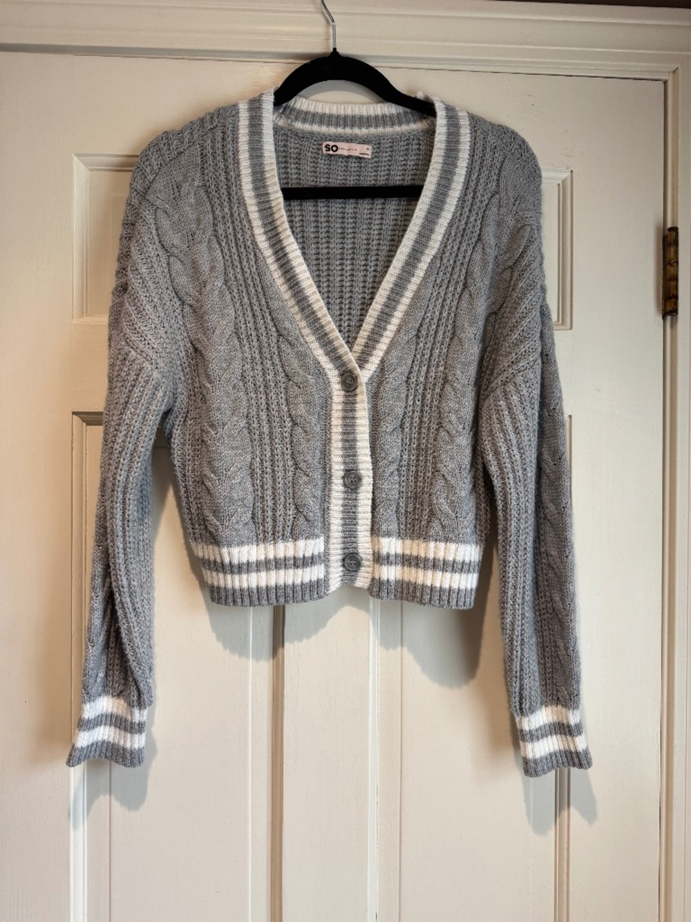 Grey and white cardigan.